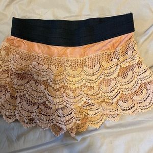 Orange lace ruffle shorts